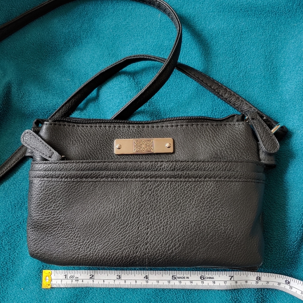 Black small shoulder bag 6x8inch long shoulder strap unknown brand never used
